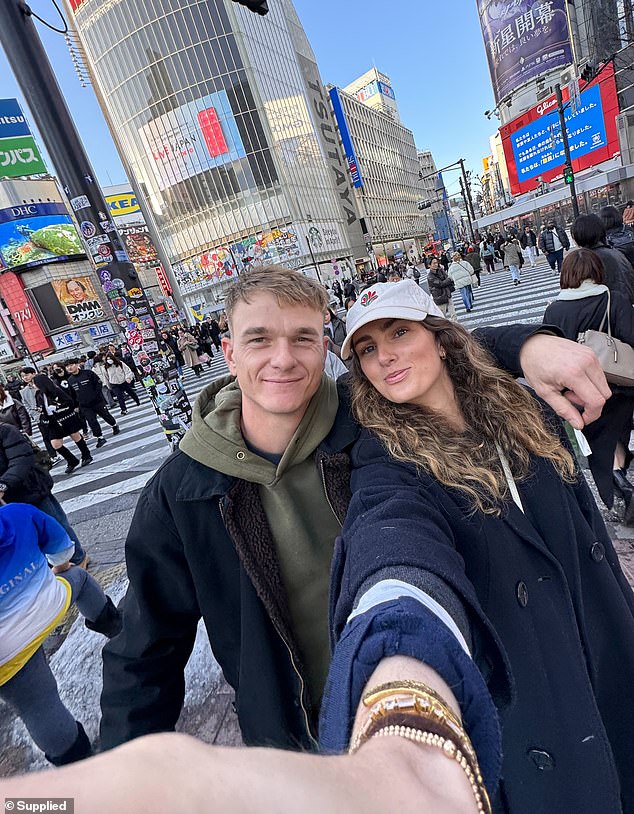 He was told he would never walk again, however the couple remain hopeful. Pictured: Johnny and his fiancé Charlie in happier times