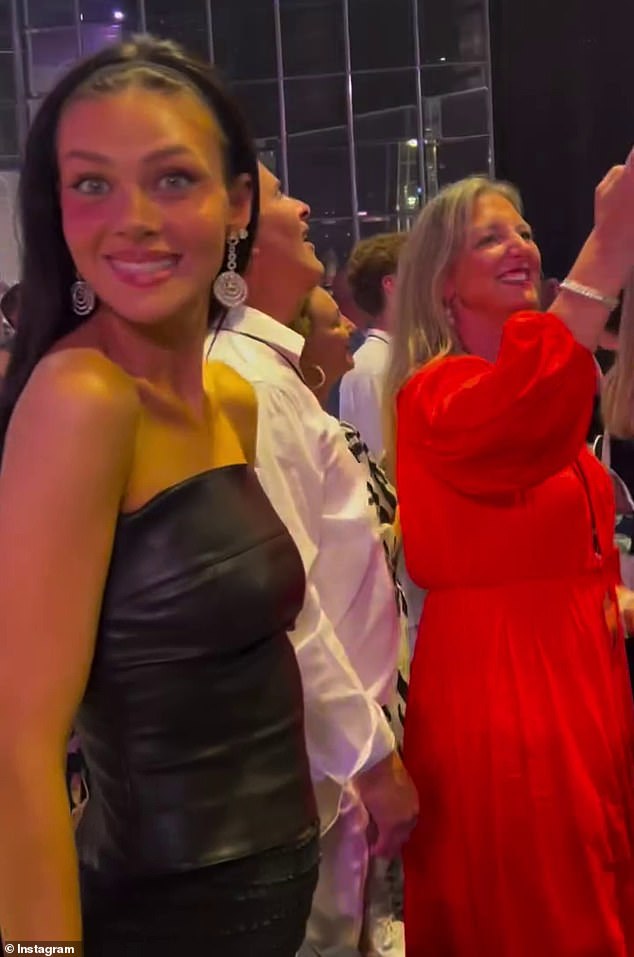 Nicola  (L) stunned in a black leather mini dress as she strutted her stuff on the dance floor before enjoying a lavish fireworks display