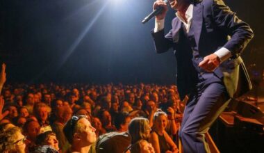A UK charity shop has been swamped with fans after Nick Cave dropped off books from his collection. Photo: AP PHOTO