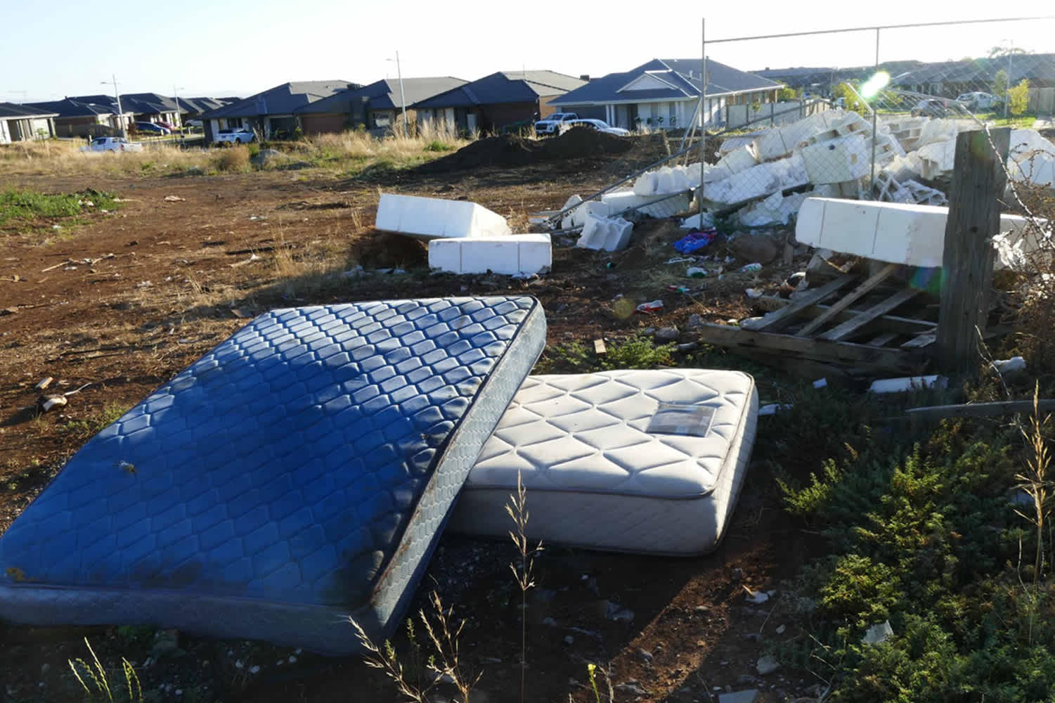 Mattresses and building waste in a housing estate in Maddingley
