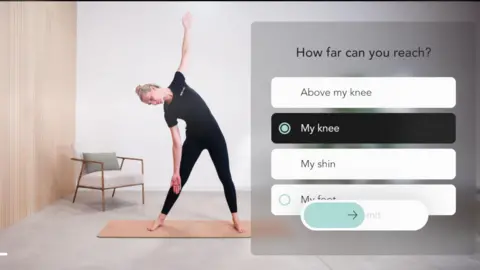 Flok Health A screen grab from the app. On the right is the question "how far can you reach?" with a series of multiple choice answers below, such as 'my knee' for the patient to select. On the right, a physiotherapist, dressed in black leggings and T-shirt is showing a stretching exercise. She has her feet apart and leans from her waist to her right hand side. Her right arm is stretching down towards her shin and her left arm is in the air.
