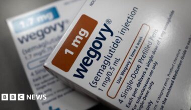 A close up of the packaging for Wegovy, a weight loss injection. It's a white box with the medication name and dosage written on it.