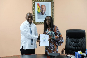 New FDA boss Professor Kwabena Frimpong-Manso Opuni (L) with former FDA boss Delese Darko (R)