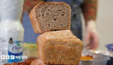 Stock image showing a loaf of bread on top of another.