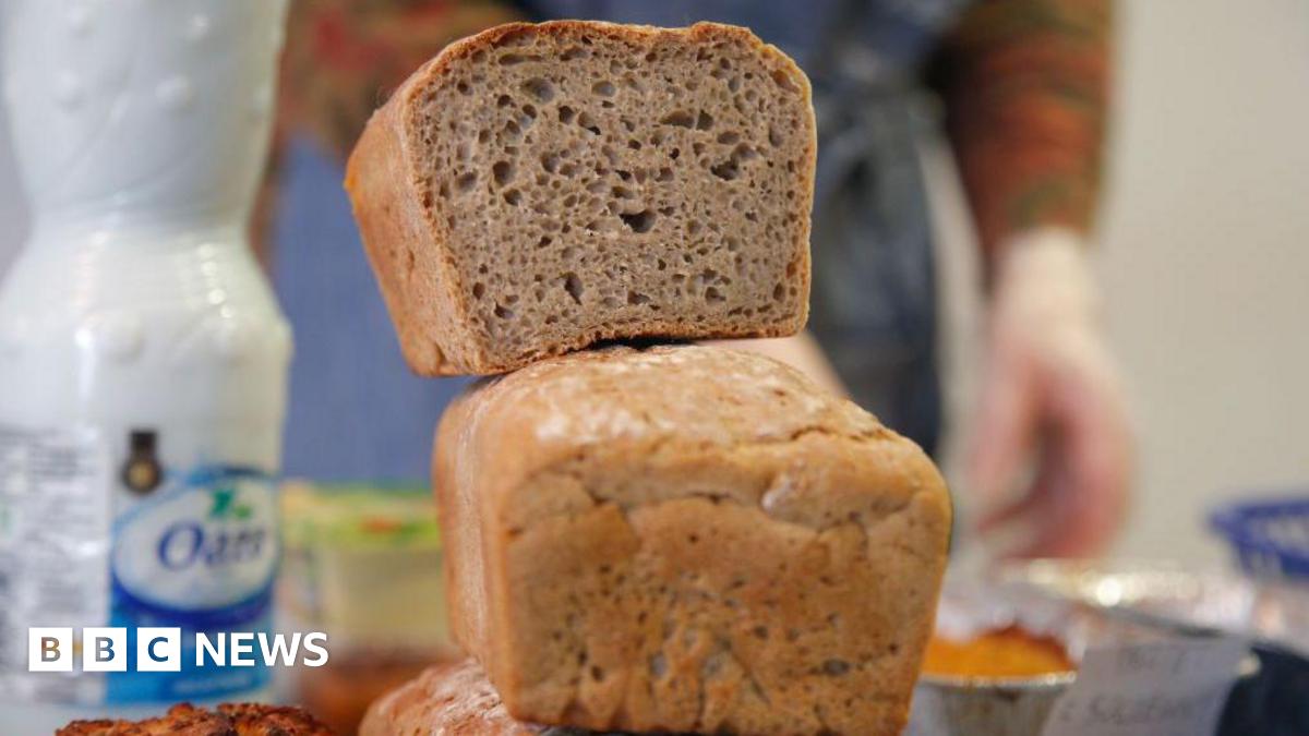 Stock image showing a loaf of bread on top of another.