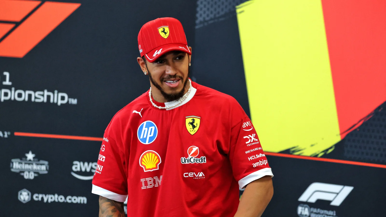 Lewis Hamilton has explained why he has been handing documents to Ferrari