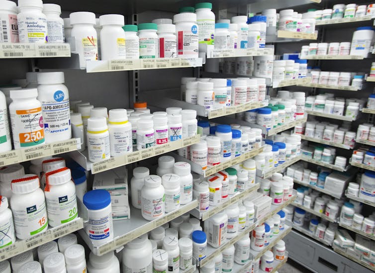 Shelves of prescription drugs at a pharmacy