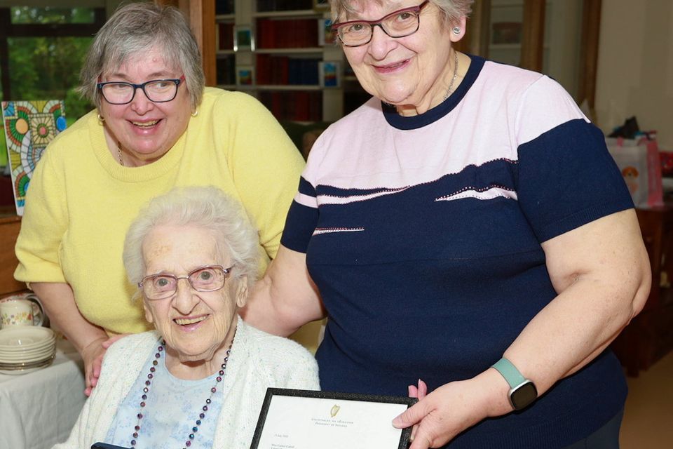 Carmel Carroll with her nieces Edel and Jacinta Quinn celebrating turning 102 with family, friends and staff in Valentia Nursing Home Camolin. PHOTO: Sabrina Ffrench 