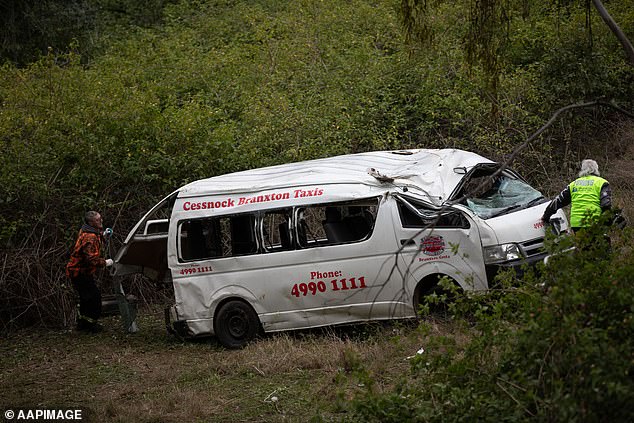 Mr Barrett's family expressed their support for the minibus driver in a joint statement released on Friday. Pictured is the crash scene