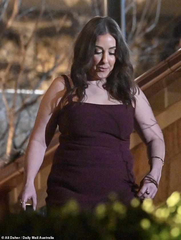 Another bride showed off her curves in a burgundy dress