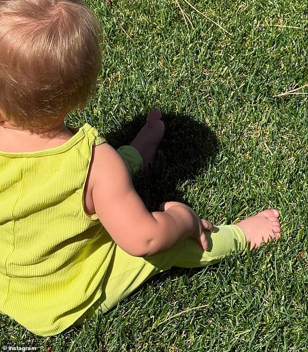 Hailey recently uploaded a rare photo of her son Jack as he sat underneath the warm sunshine in an adorable yellow outfit