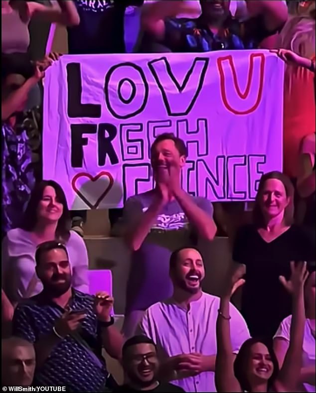 There was also a sign in the crowd that appeared to read 'LOV U FR6SH CRINCE'