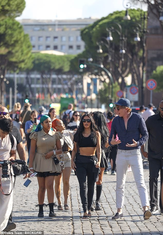Kim and North appeared to have a tour guide leading them through the Colosseum