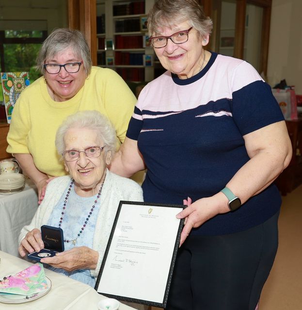 Carmel Carroll with her nieces Edel and Jacinta Quinn celebrating turning 102 with family, friends and staff in Valentia Nursing Home Camolin. PHOTO: Sabrina Ffrench 