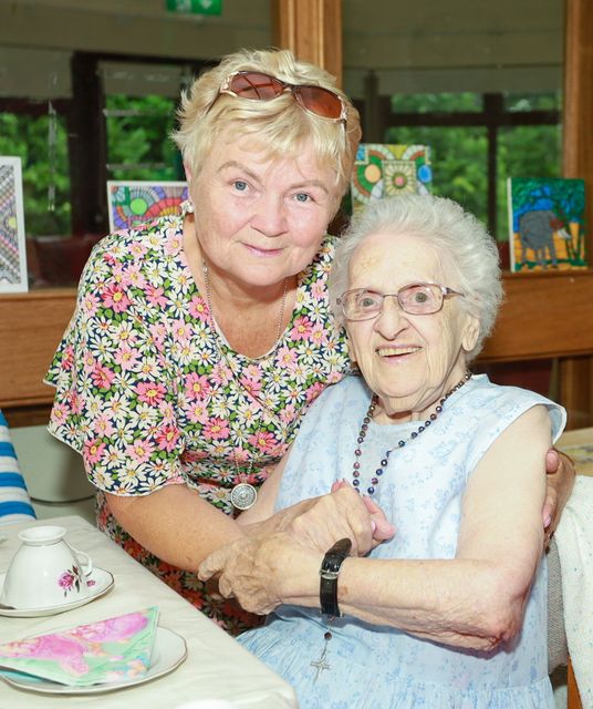 Mary Owley with Carmel Carroll celebrating turning 102 with family, friends and staff in Valentia Nursing Home Camolin. PHOTO: Sabrina Ffrench