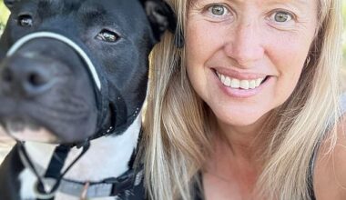 Cancer survivor Julie Elder (right) sought to buy the personalised number plates 'K9 CAB' in honour of her dog, Elton (left)