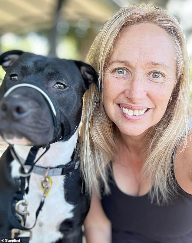 Cancer survivor Julie Elder (right) sought to buy the personalised number plates 'K9 CAB' in honour of her dog, Elton (left)