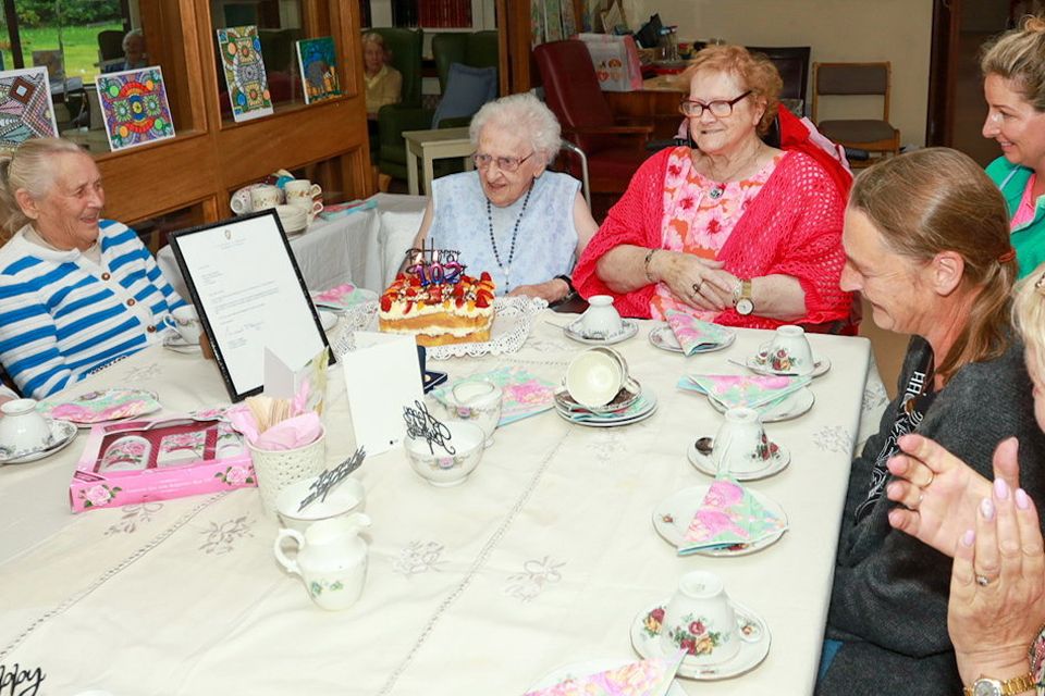 Carmel Carroll celebrating turning 102 with family, friends and staff in Valentia Nursing Home Camolin. PHOTO: Sabrina Ffrench