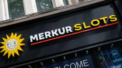 Getty Images Merkur Slots branding on a shopfront