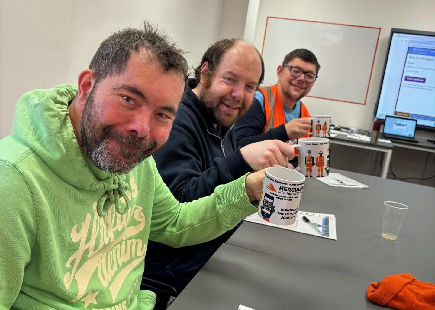 Members of Hercules Academy raising a toast to the Academy.