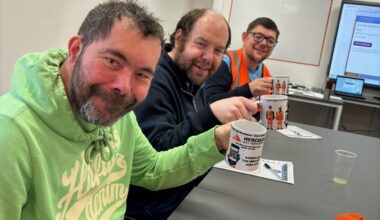 Members of Hercules Academy raising a toast to the Academy.