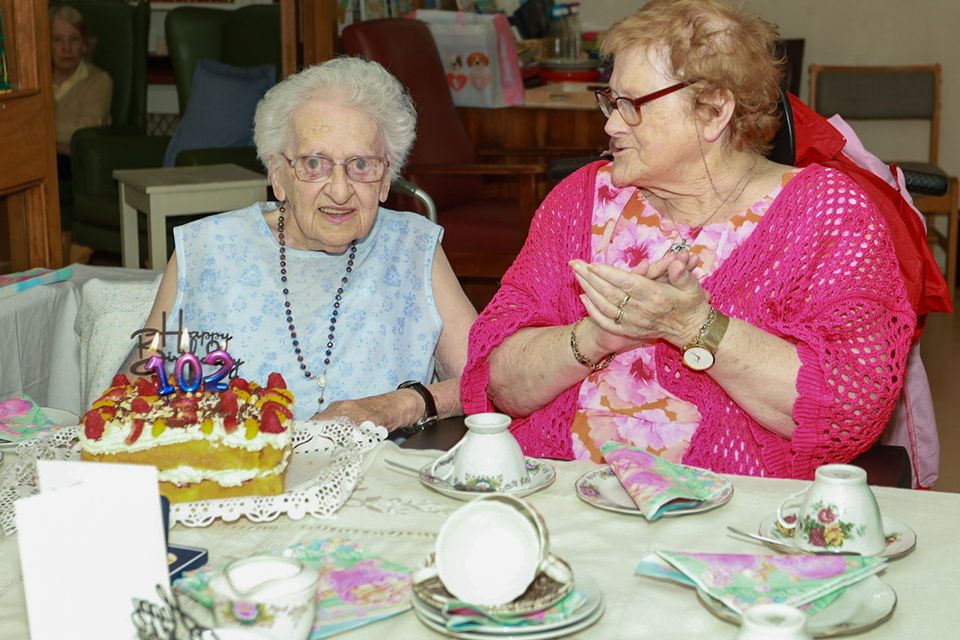 Carmel Carroll celebrating turning 102 with family, friends and staff in Valentia Nursing Home Camolin. PHOTO: Sabrina Ffrench