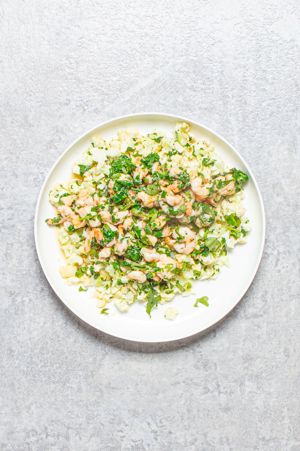 Juicy prawns tossed in garlic and cumin, served over fluffy cauliflower rice for a lighter, fresher take on a classic