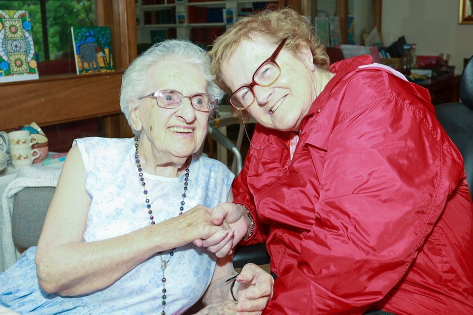 Carmel Carroll with her friend Ann Cushe celebrating turning 102 with family, friends and staff in Valentia Nursing Home Camolin. PHOTO: Sabrina Ffrench