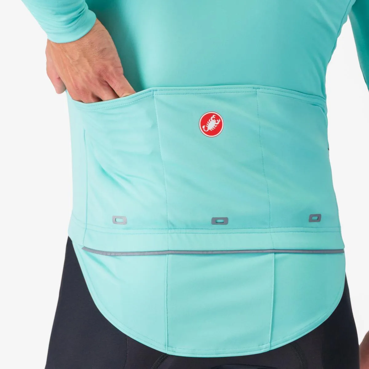 Castelli Perfetto 3 RoS Jacket rear pocket and drop tail close up.