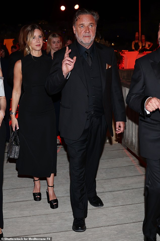 Russell was also looking slimmer than ever in June at the Golden Bee Awards in Malta alongside his fiancée Britney Theriot (pictured)