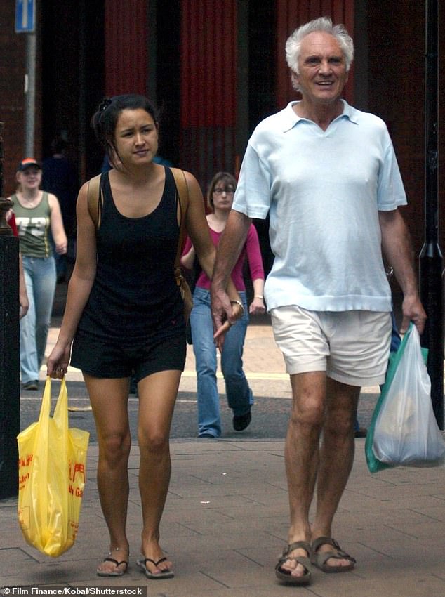 Elizabeth's family was reportedly concerned about their 35-year age difference (the couple pictured together in London, 2003)