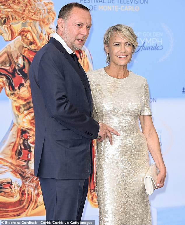 Like several American celebrities, Robin Wright decided to move to England a few years ago where she met her British-born Australian boyfriend, Henry Smith (pictured June 17)