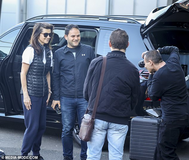The actress completed her look with a pair of black sneakers and slung a black bag across her body