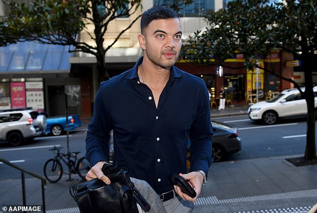 Guy Sebastian arrives at court during Titus Day’s trial in 2022