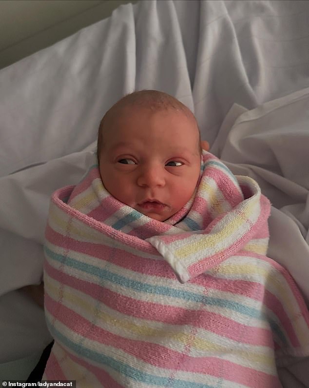 'Third time really is a charm. Our sweet little Poppy girl is here and we are all utterly obsessed with every inch of you,' Laura announced on Instagram