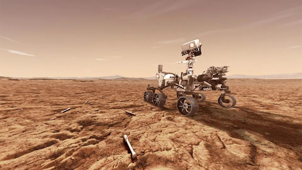  A rendering of the Perseverance Rover on the surface of Mars with a sealed sample on the ground. 