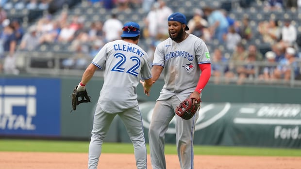 Blue Jays secure playoff spot with 8-5 win against Royals