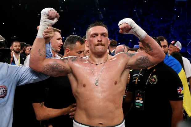 Oleksandr Usyk celebrates after being awarded victory after defeating Daniel Dubois during the Heavyweight fight between Oleksandr Usyk and Daniel Dubois at Stadion Wroclaw on August 26, 2023 in Wroclaw, Poland. (Photo by Gabriel Kuchta/Getty Images)