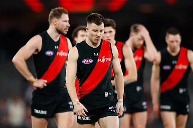 Zach Merrett of the Bombers looks dejected after their round 23 loss to Sydney.