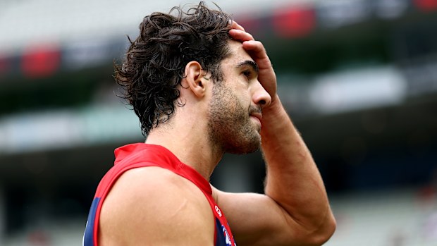 Christian Petracca of the Demons looks dejected after losing the round three AFL match