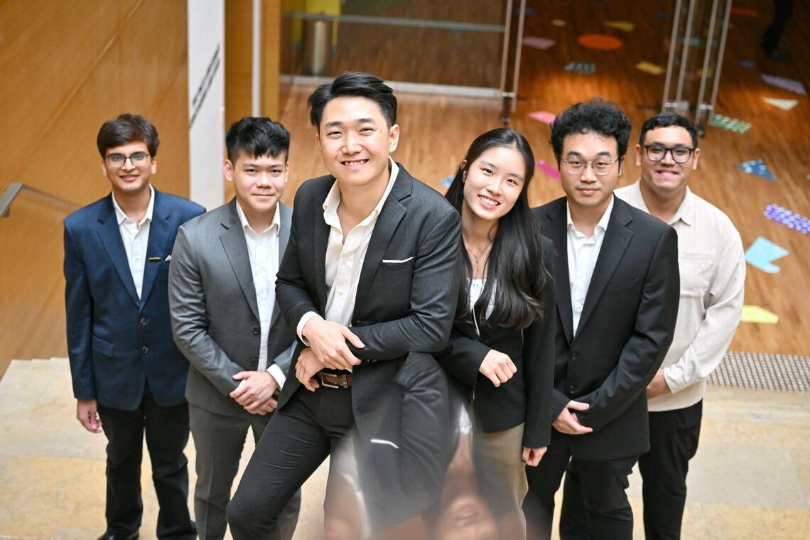 SMU students (from left) Saurabh Maskara, Kendrick Poon, Isaiah Chia, Arin Mak, Kevin Tan and Ryan Bangras developed a tool that aims to find young people facing issues. The tool clinched top prize at this year’s Dell InnovateFest.