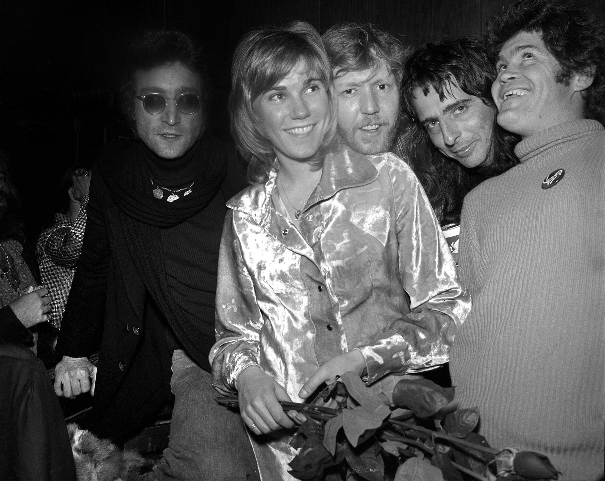 Drinking buddies known as 'The Hollywood Vampires' (L-R -- John Lennon (during his 'Lost Weekend' period), Harry Nilsson, Alice Cooper and Micky Dolenz celebrate an early Thanksgiving with singer Anne Murray (2nd from left) at the Troubadour on November 21, 1973 in Los Angeles, California.