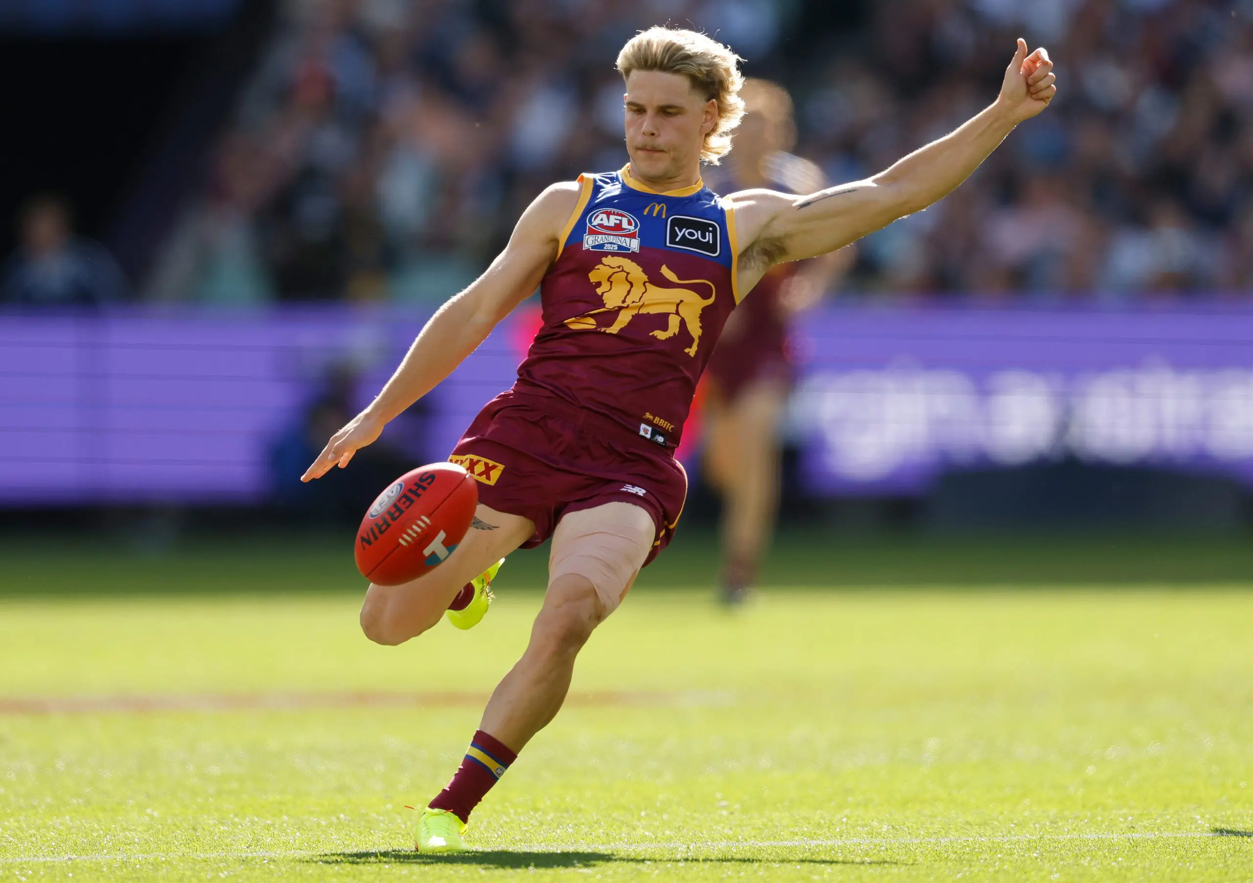 MELBOURNE, AUSTRALIA - SEPTEMBER 27: Will Ashcroft of the Lions kicks the ball during the AFL Grand Final match between the Geelong Cats and the Brisbane Lions at the Melbourne Cricket Ground on September 27, 2025 in Melbourne, Australia. (Photo by Michael Willson/AFL Photos via Getty Images)