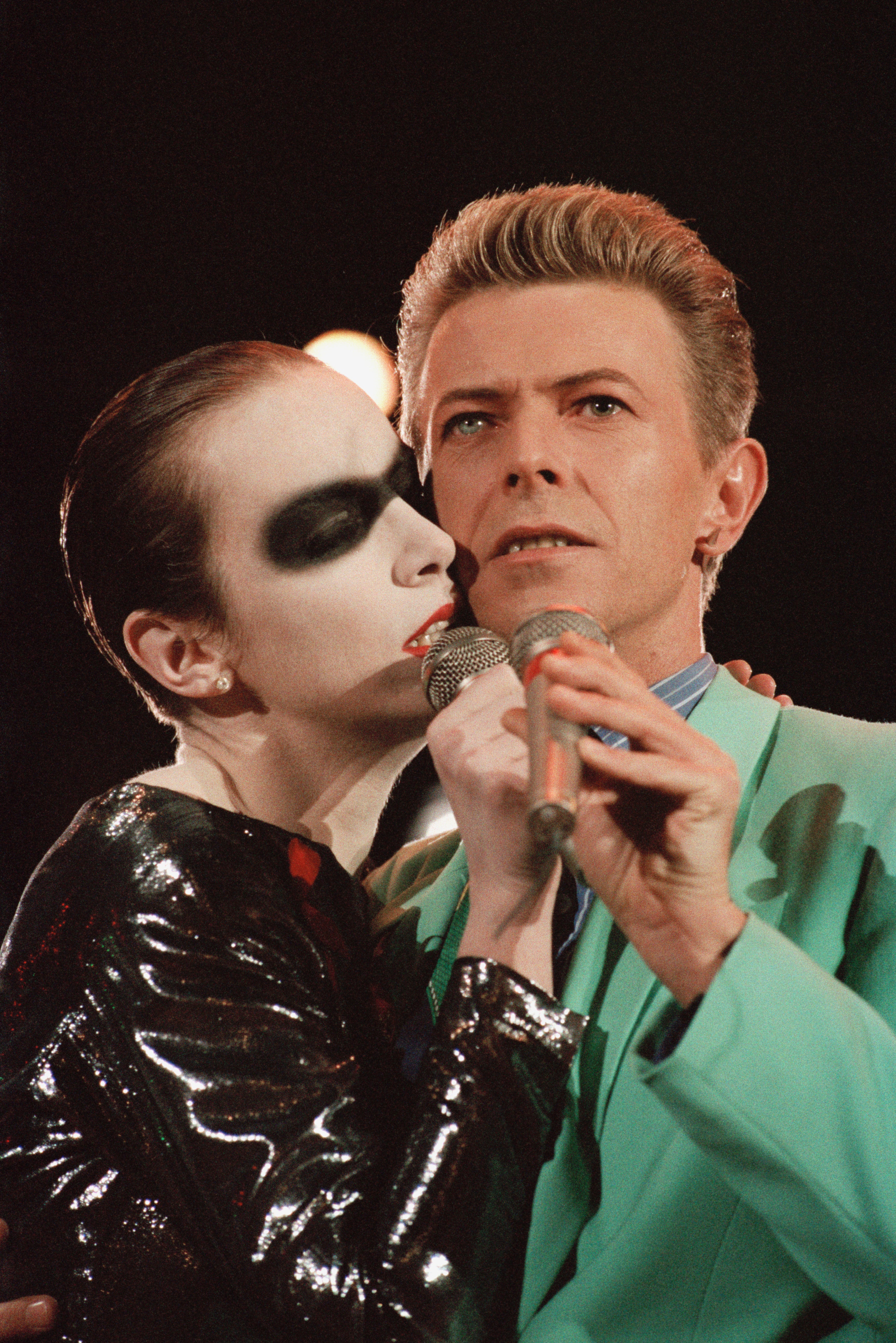 Lennox performs ‘Under Pressure’ with David Bowie at the Freddie Mercury Tribute Concert at London’s Wembley Stadium in 1992