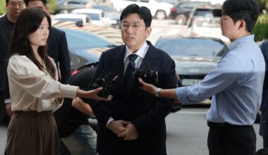 HYBE chairman Bang appears before police for questioning