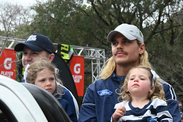 Smith (right) in the grand final parade with Winnifred Dangerfield. 