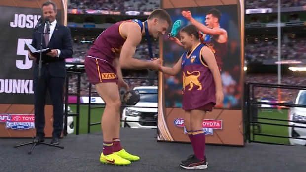An Auskicker delivers a heart-melting message to Brisbane's Josh Dunkley following the Lions' grand final victory.