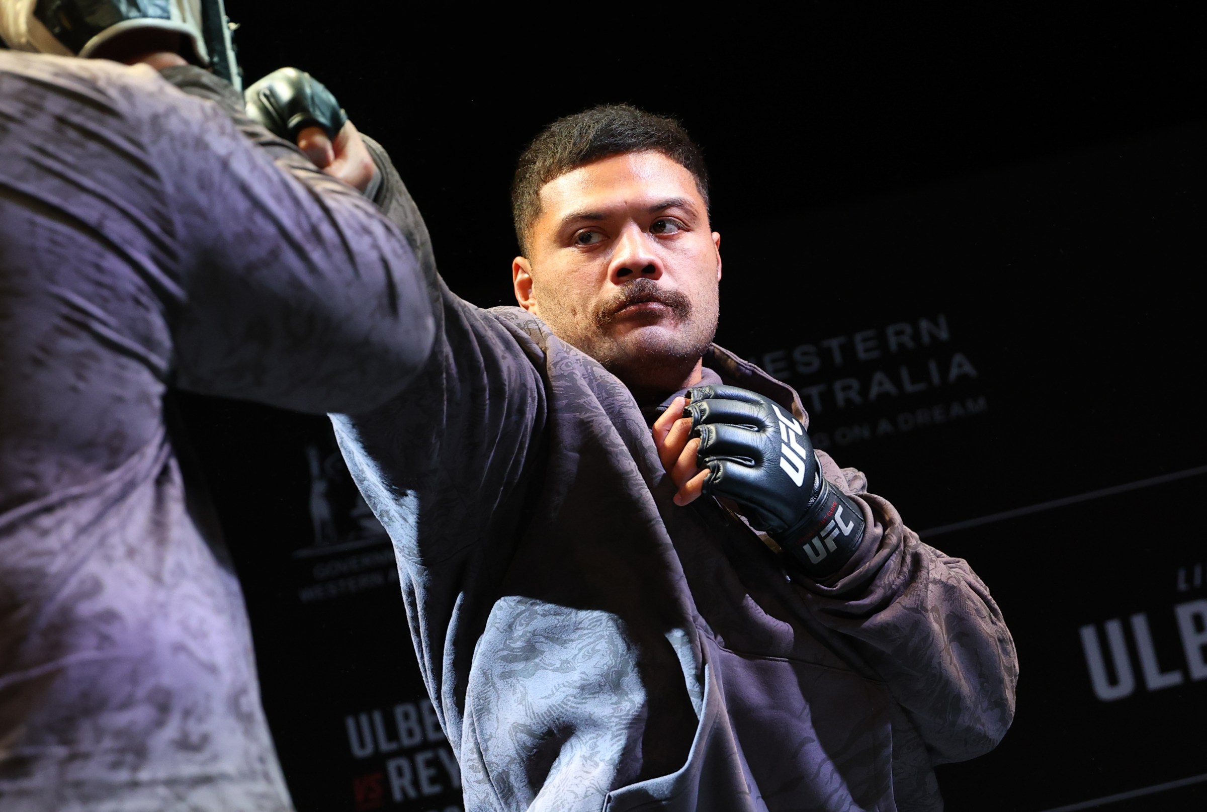PERTH, AUSTRALIA - SEPTEMBER 25: Justin Tafa works out for fans and media at the Eve nightclub at Crown Perth on September 25, 2025 in Perth, Australia. (Photo by Ed Mulholland/Zuffa LLC)