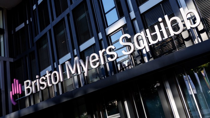 The Bristol Myers Squibb logo is displayed on the facade of the company's Munich headquarters.