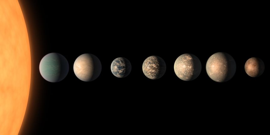An artist's concept showing the TRAPPIST-1 planetary system. Astronomers believe three planets in the system orbit the star in the habitable zone, where liquid water could be present -- if those planets have an atmosphere.